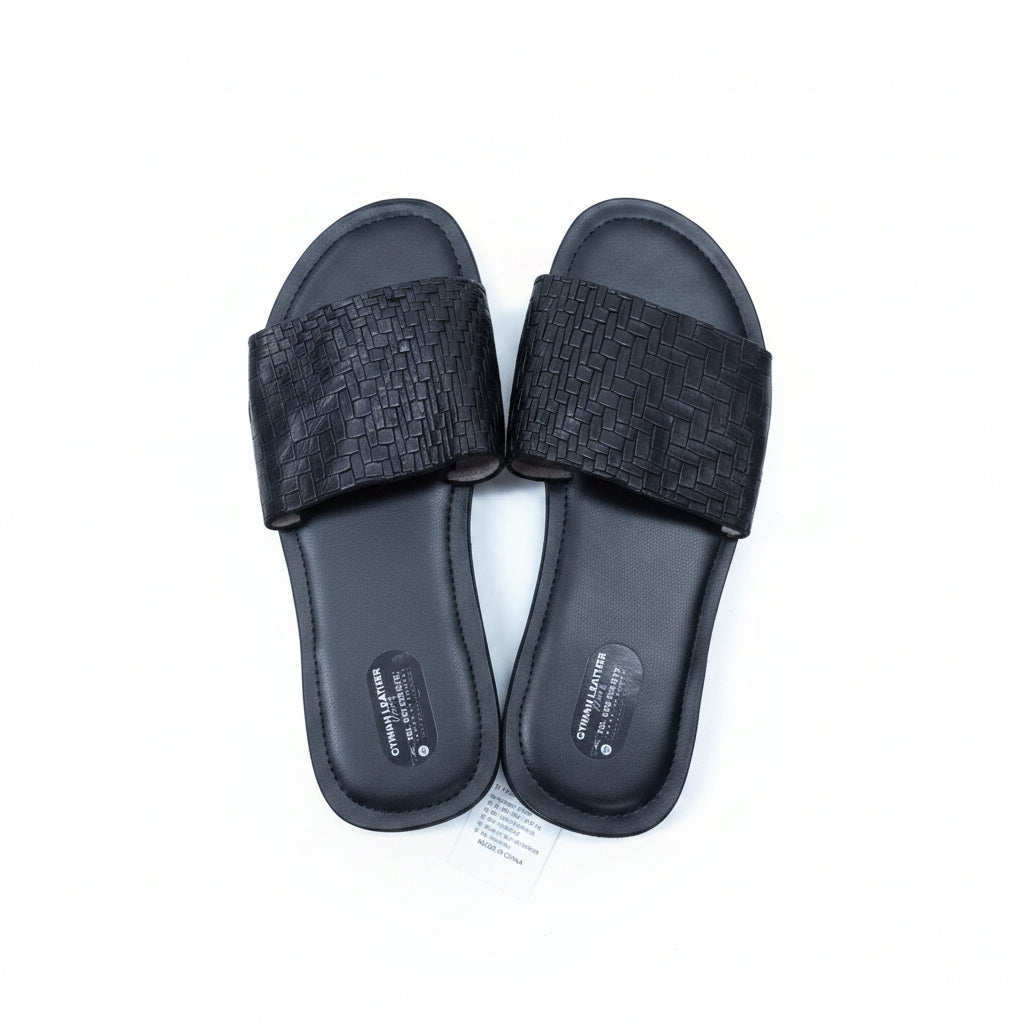 Black slides with textured straps 